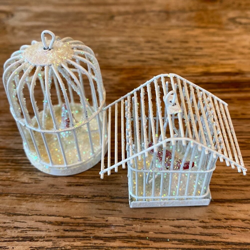 A Pair of White Wire Birdhouse Ornaments w/Red Birds on Swings